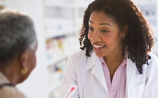 Pharmacist helping a customer